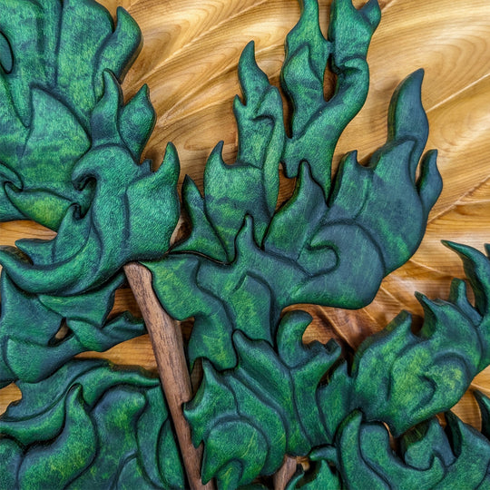 Close-up of the fine craftsmanship on The Windswept Pine sculpture by Alex Jepson, highlighting the intricate wood carving details.
